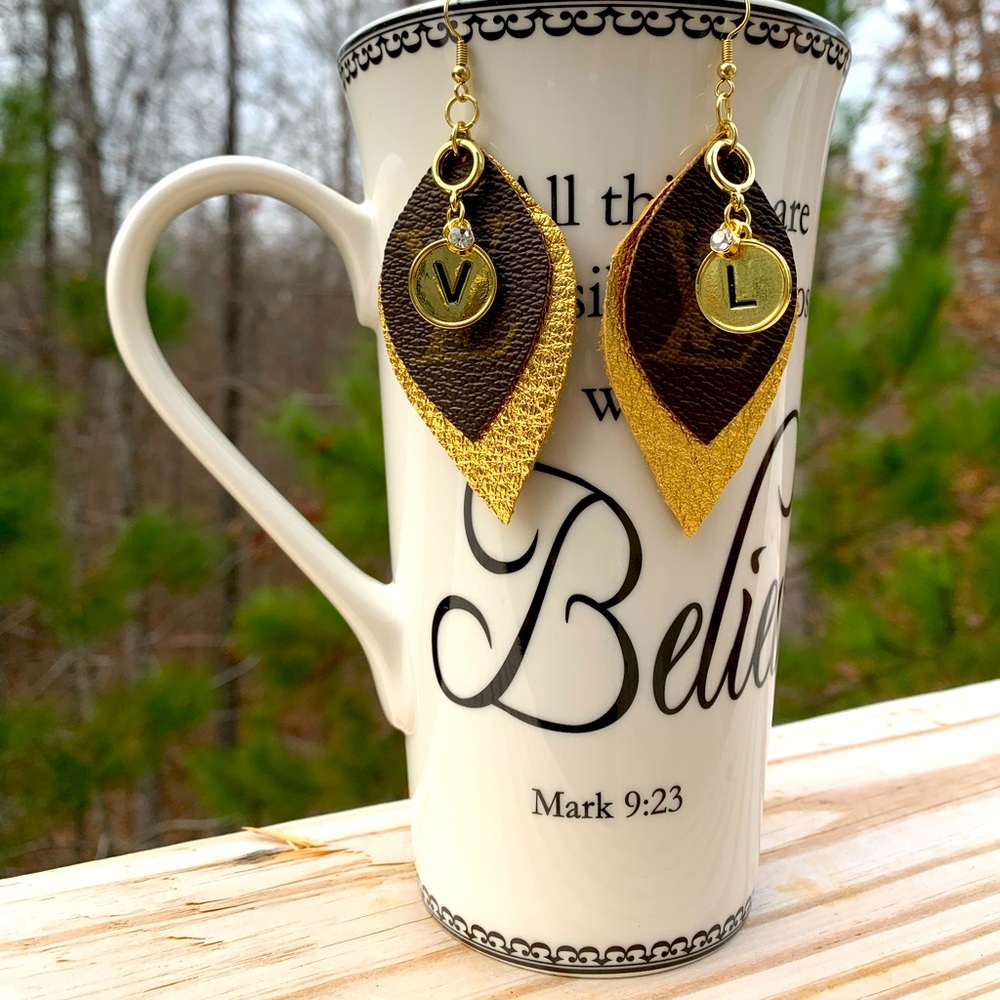 Upcycled monogram canvas and leather earrings.